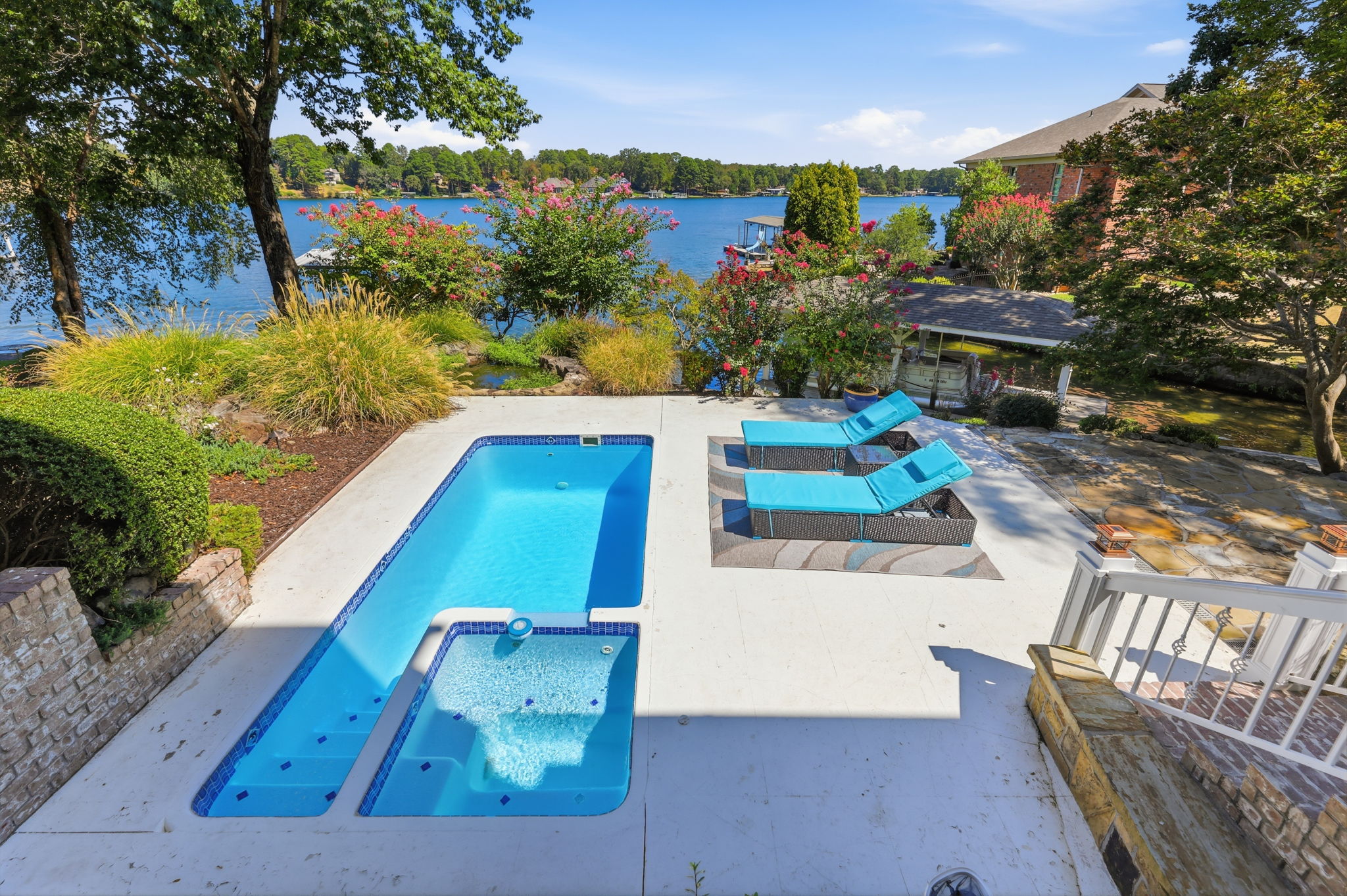 Pool overlooking the lake at a waterfront home listing in Hot Springs, Arkansas